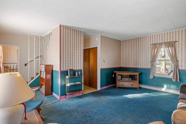 living room featuring carpet flooring and baseboard heating