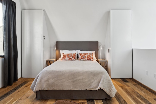 bedroom featuring hardwood / wood-style floors