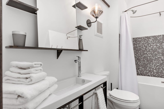 bathroom featuring sink and toilet