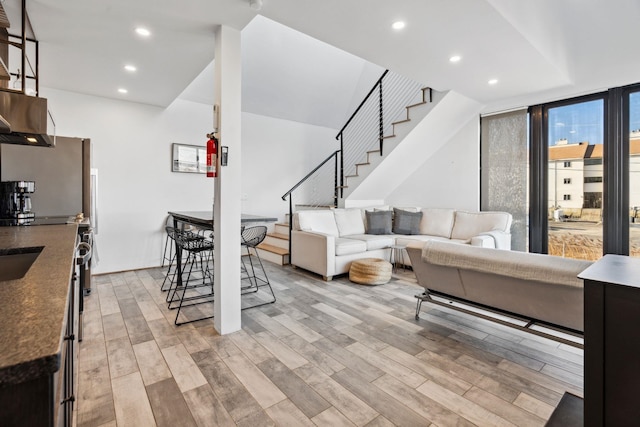 living room with light hardwood / wood-style floors