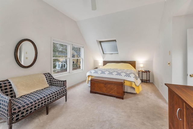 carpeted bedroom featuring ceiling fan and vaulted ceiling