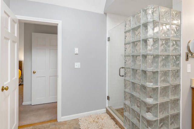 bathroom featuring an enclosed shower