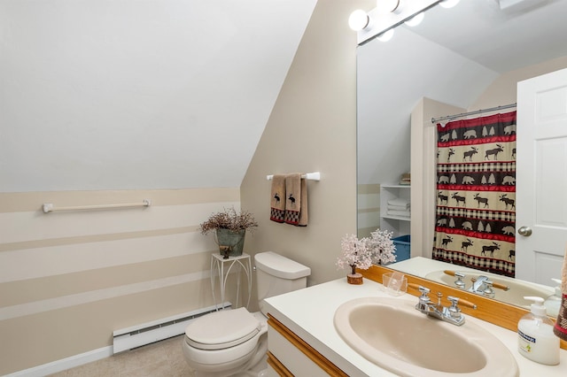 bathroom featuring vanity, toilet, baseboard heating, and vaulted ceiling