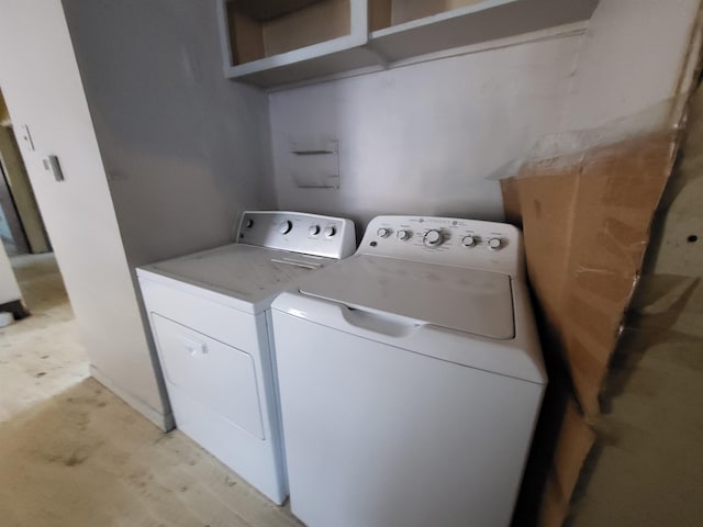 laundry area featuring washing machine and dryer