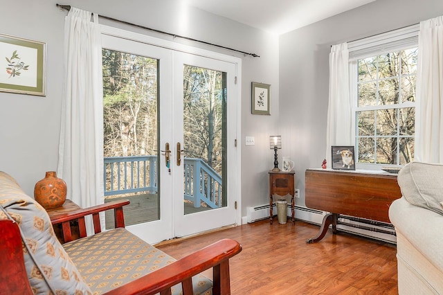 entryway featuring hardwood / wood-style flooring and french doors