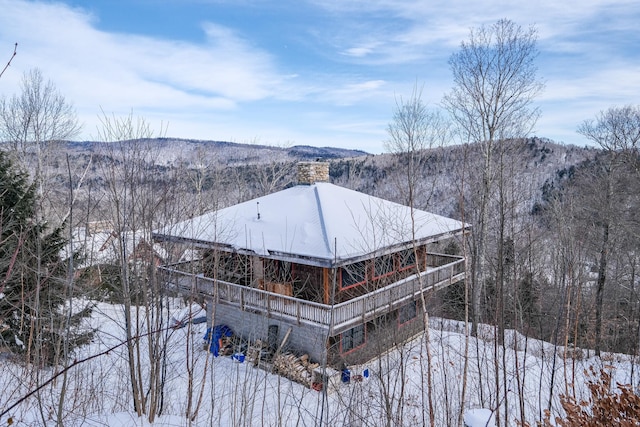 241 Bear Hill Rd, Plymouth, VT 05056 - snow covered structure with a mountain view