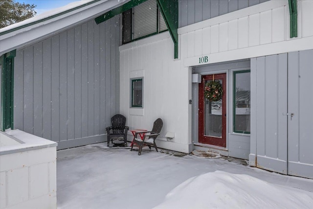 doorway to property with a patio area