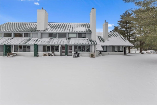 view of snow covered property