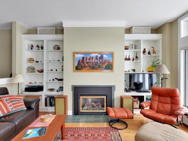 sitting room with a fireplace with flush hearth