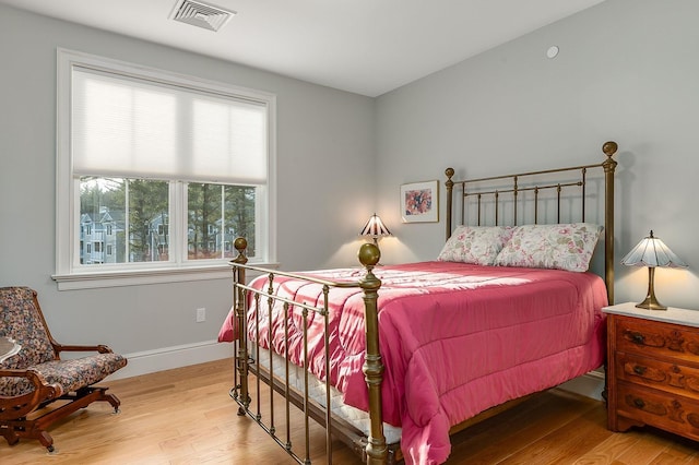 bedroom featuring light hardwood / wood-style floors