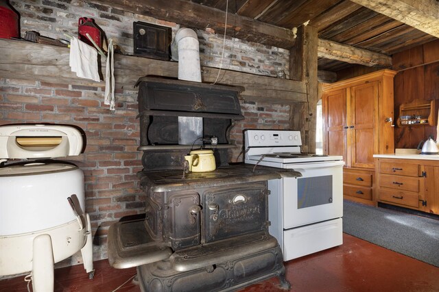 61 Crosby Rd, Topsham, VT 05076 - kitchen with white range with electric cooktop, wood ceiling, and brick wall