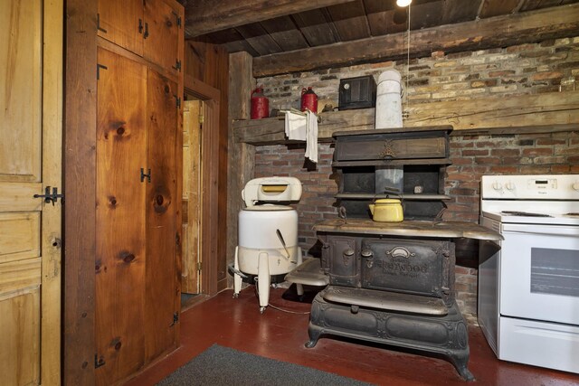61 Crosby Rd, Topsham, VT 05076 - interior space with brick wall, wood ceiling, beam ceiling, electric range, and wood walls