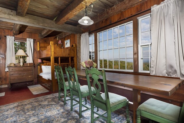 61 Crosby Rd, Topsham, VT 05076 - dining space featuring beam ceiling, wood walls, and wooden ceiling