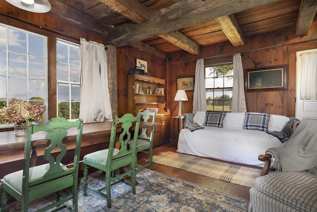 61 Crosby Rd, Topsham, VT 05076 - living area with beamed ceiling, dark hardwood / wood-style flooring, wood ceiling, and wooden walls