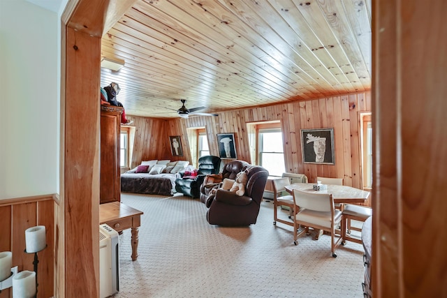 carpeted bedroom with wooden ceiling