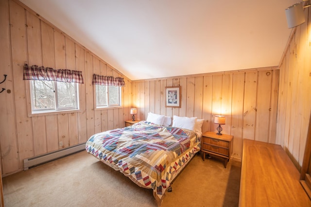 bedroom with carpet, a baseboard radiator, and lofted ceiling