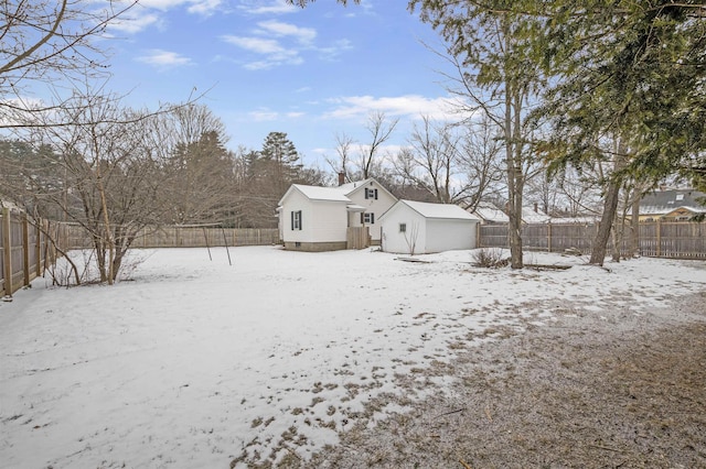 view of yard covered in snow