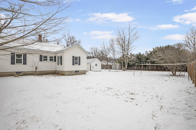 exterior space featuring a shed