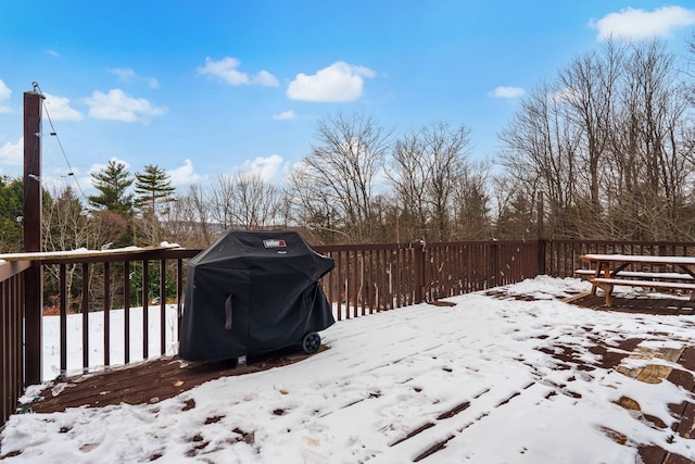 view of snow covered deck