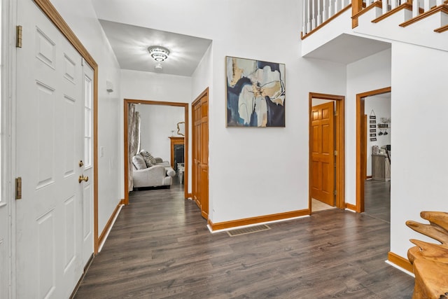 hallway featuring dark hardwood / wood-style floors