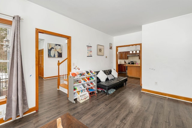 living room with dark hardwood / wood-style floors