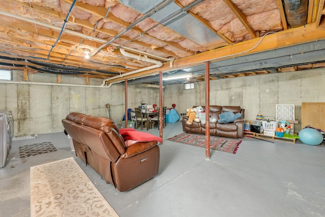 basement with washing machine and dryer