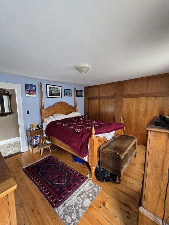 bedroom with light hardwood / wood-style floors