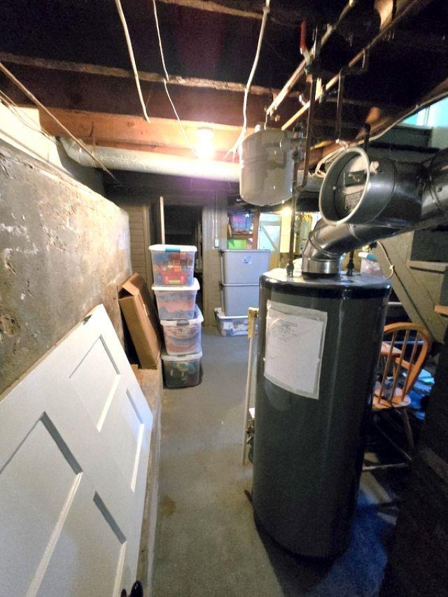 basement featuring water heater