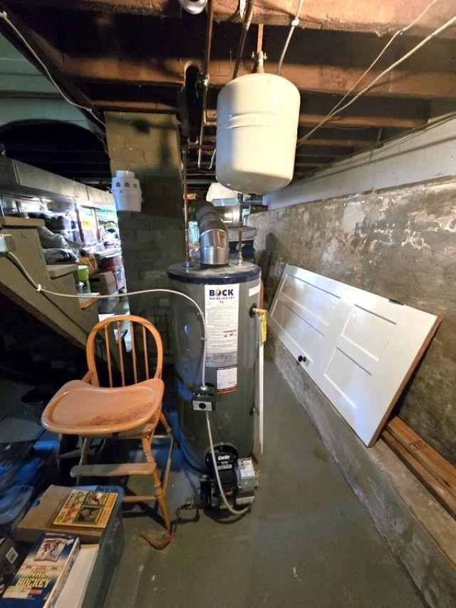 utility room with water heater