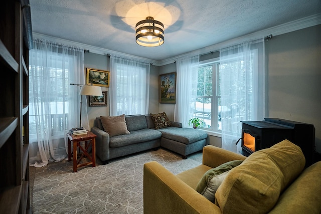 living room with crown molding, a textured ceiling, and a notable chandelier