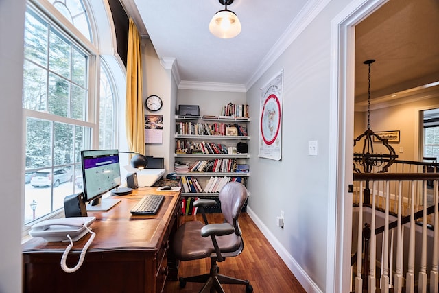 office area featuring ornamental molding, dark wood-type flooring, and a notable chandelier