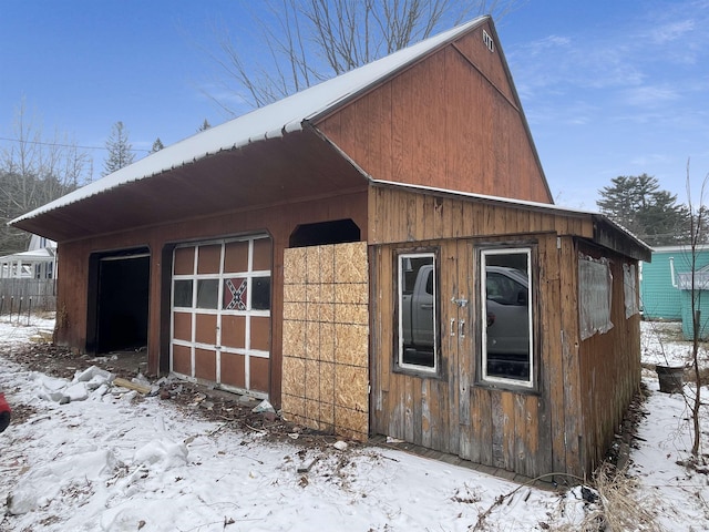 view of snow covered garage