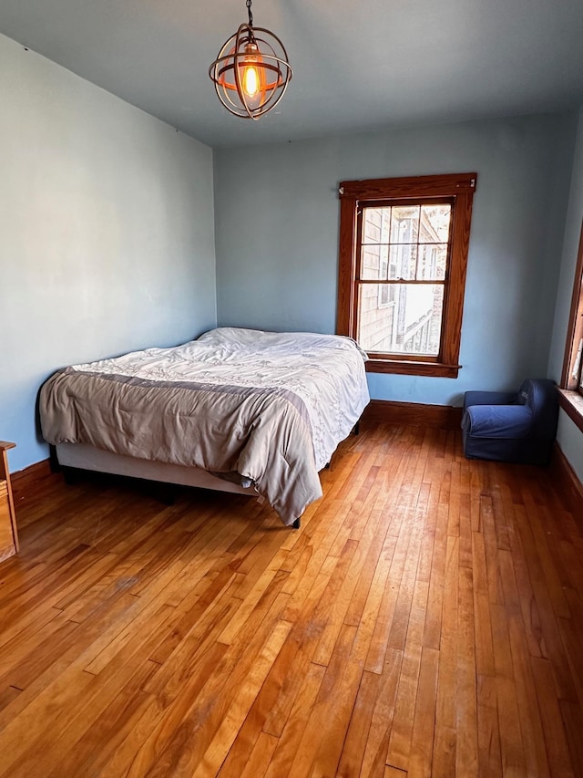 bedroom with light hardwood / wood-style floors