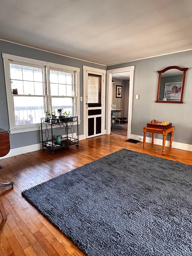 living room with dark wood-type flooring