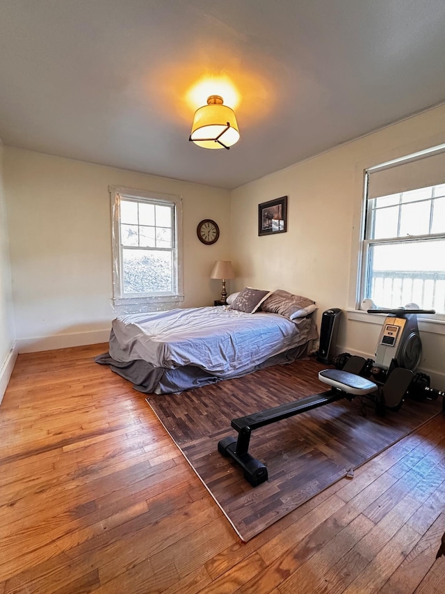 bedroom with light hardwood / wood-style floors