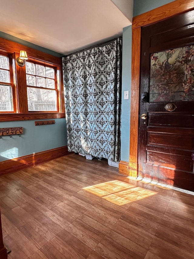 unfurnished room featuring hardwood / wood-style floors