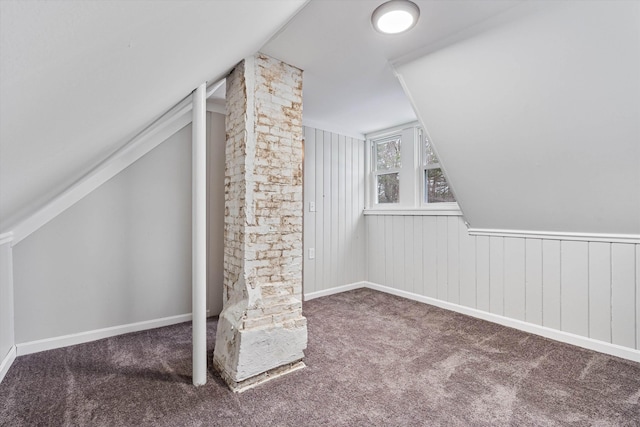 additional living space with carpet and lofted ceiling