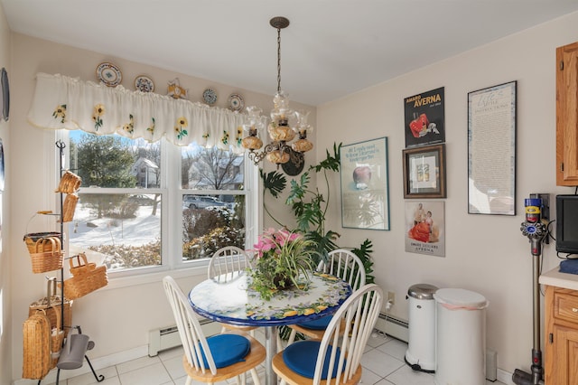 tiled dining area featuring a healthy amount of sunlight, baseboard heating, and a notable chandelier