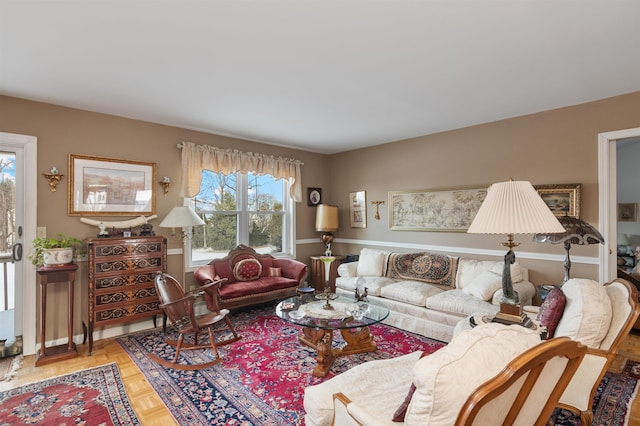 living room featuring parquet flooring