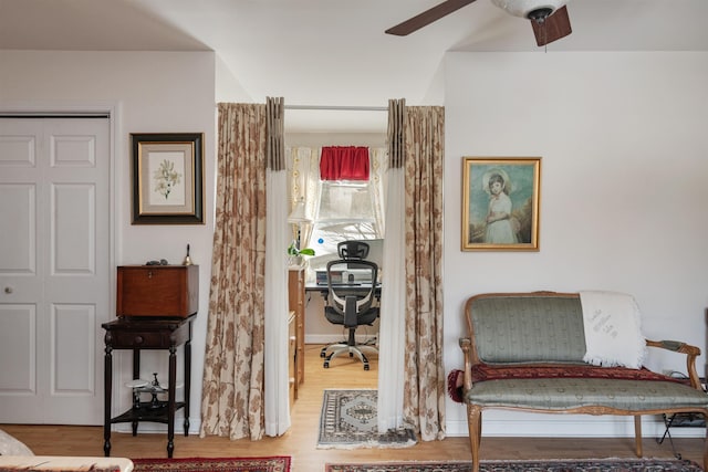 sitting room featuring hardwood / wood-style floors