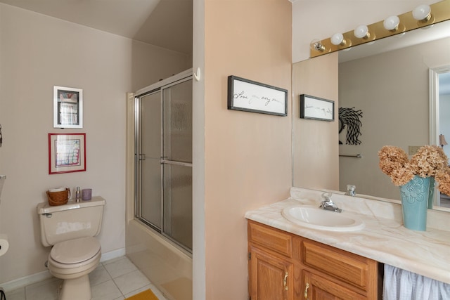 full bathroom featuring toilet, enclosed tub / shower combo, tile patterned floors, and vanity