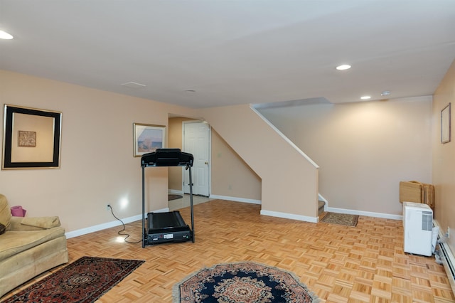 workout room with light parquet flooring