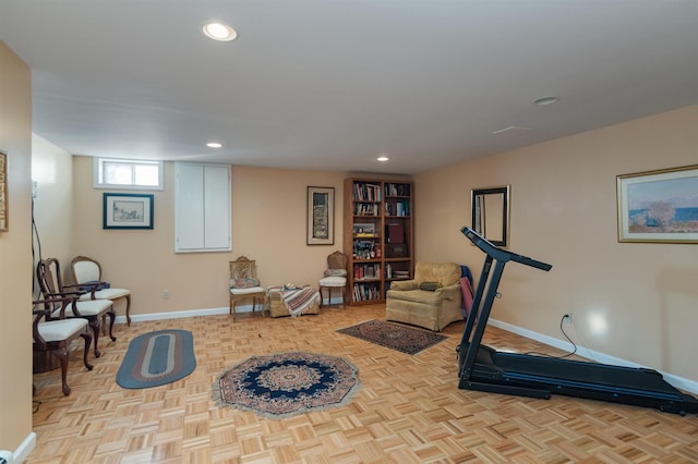 workout room with light parquet flooring