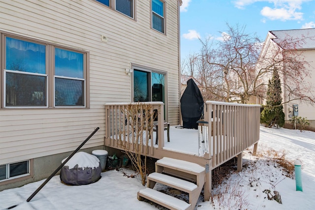 view of snow covered deck