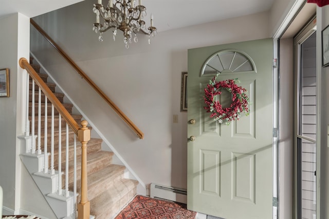 foyer entrance featuring a baseboard radiator and a notable chandelier