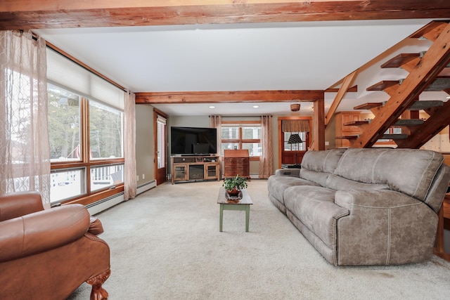 carpeted living room with baseboard heating and beamed ceiling