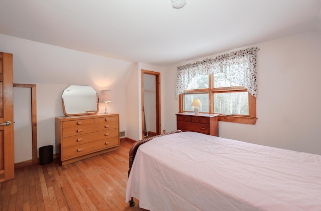 bedroom featuring light wood-type flooring