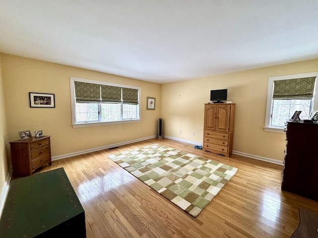 bedroom featuring light wood-type flooring