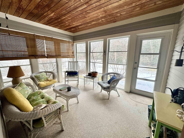 sunroom with wooden ceiling and plenty of natural light