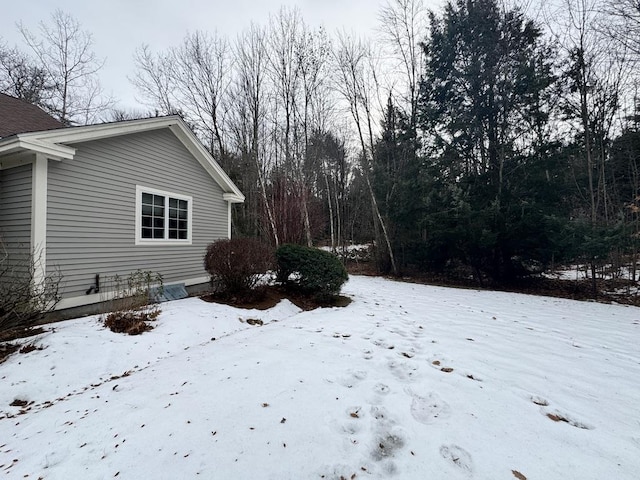 view of yard covered in snow